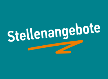 A working group in front of a whiteboard