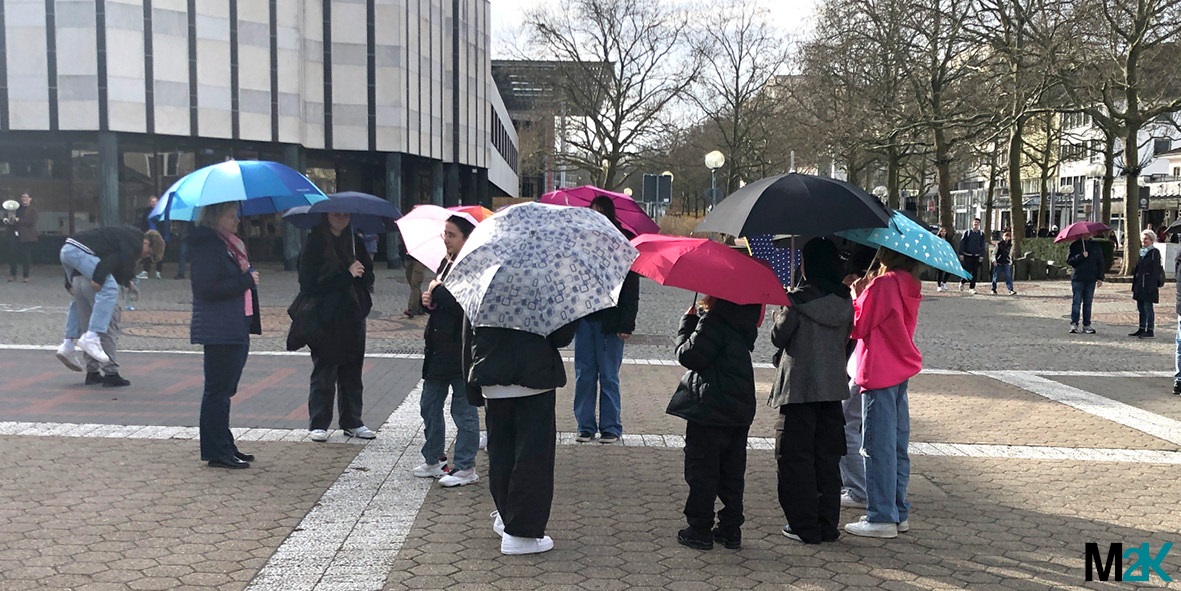 We ourselves create images in the city. An umbrella assembly.