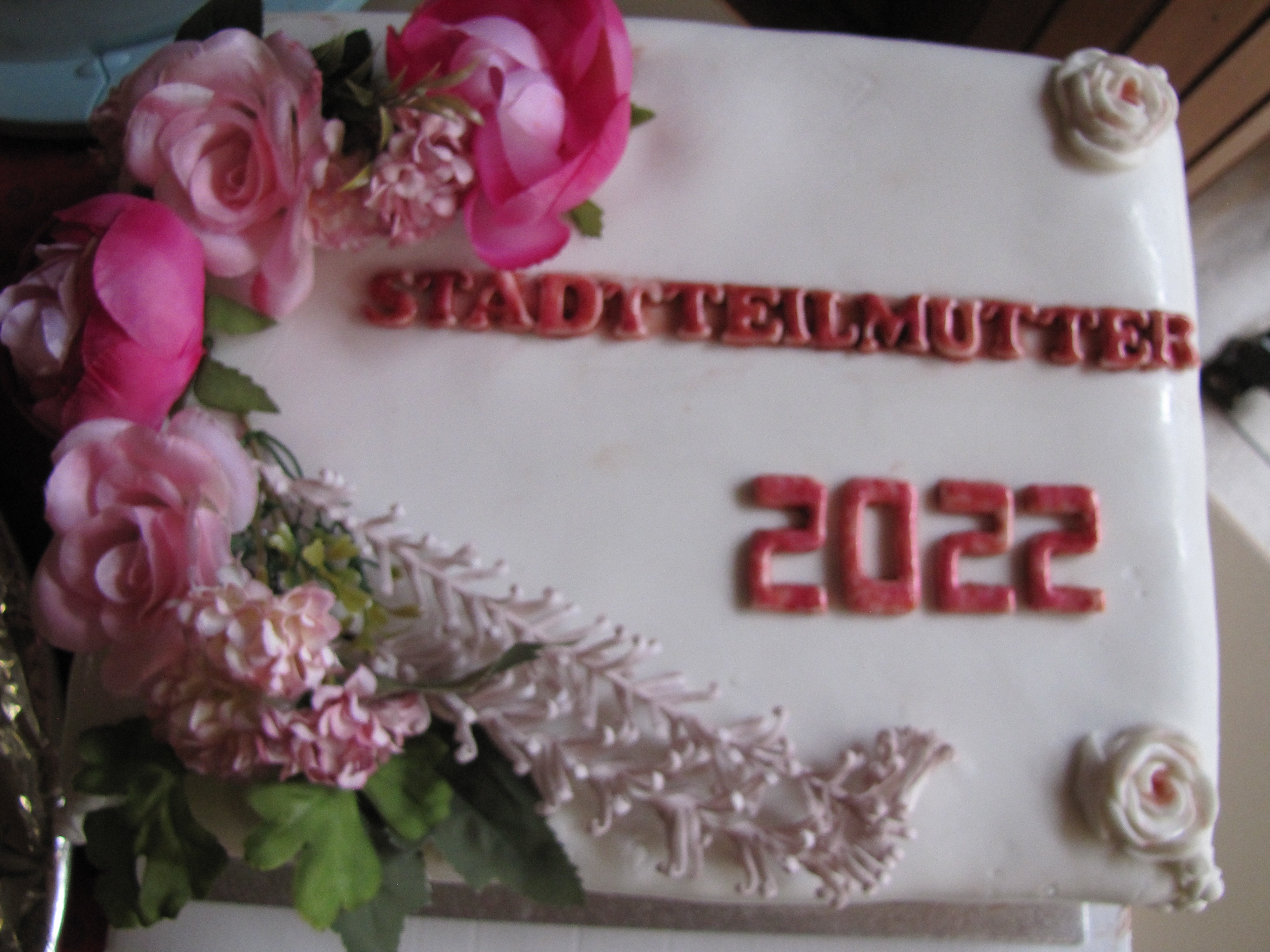 Jubiläumstorte mit der Aufschrift "Stadtteilmutter 2022"