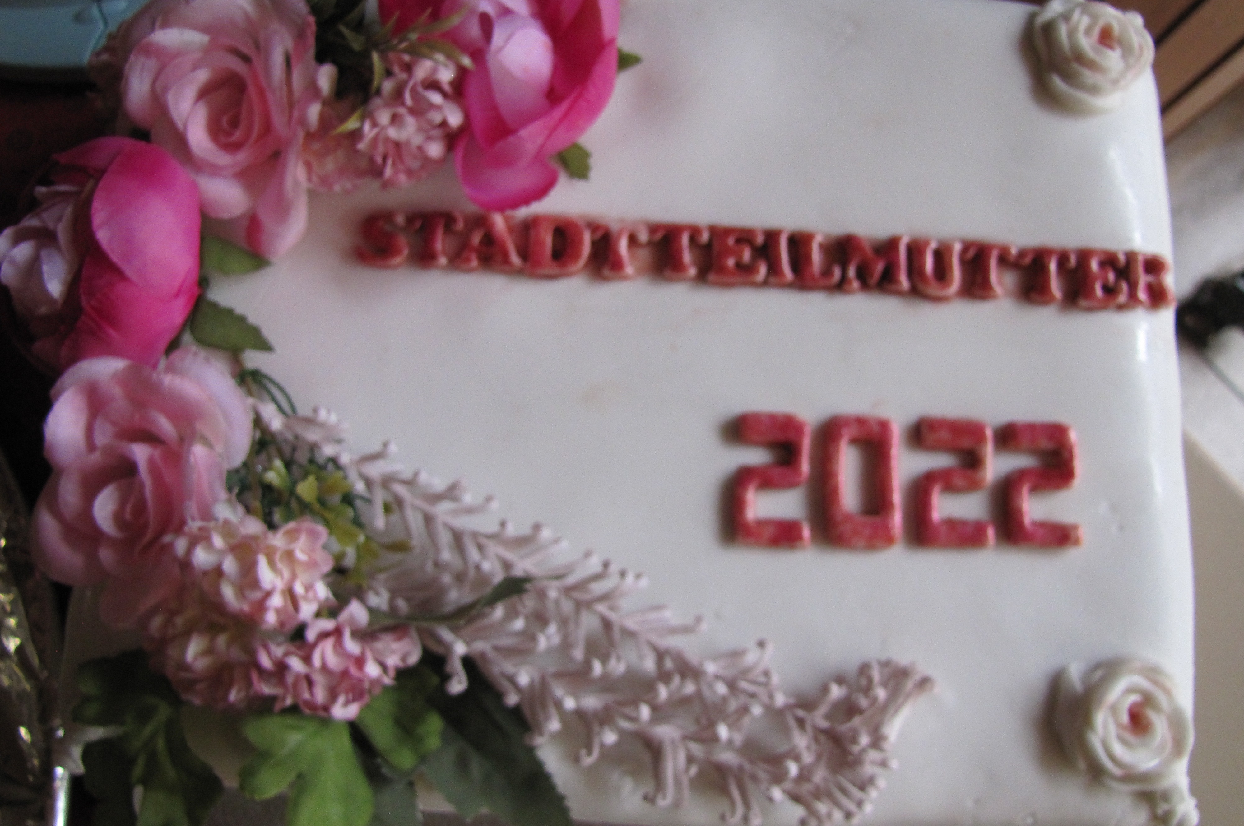 Anniversary cake with the inscription "District mother 2022".