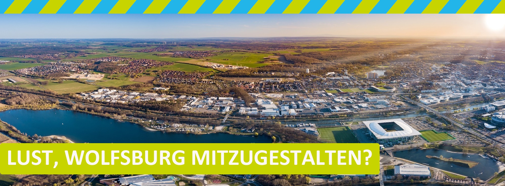 Luftbild vom Allerpark und der Schriftzug "Lust, Wolfsburg mitzugestalten?"