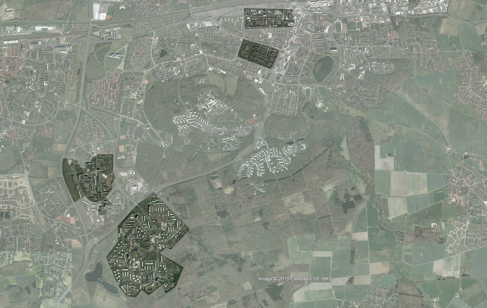 Ein Luftbild zeigt die Stadterneuerungsgebiete Handwerkerviertel, Höfe, Detmerode und Westhagen