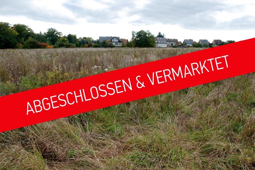 Aufnahme des Baugebietes Scharenhop mit Störer und der Aufschrift: Abgeschlossen und Vermarktet