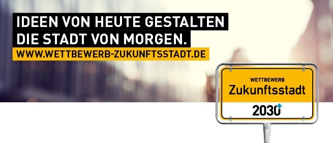 Werbebanner mit der Aufschrift: Ideen von heute gestalten die Stadt von Morgen. www.wettbewerb-zukunftsstadt.de